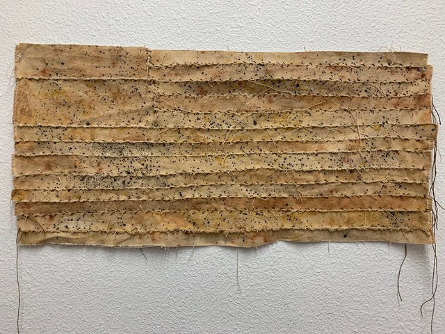 1 Blood Quantum, canvas, clay, sinew, acrylic, 31”x 14.5